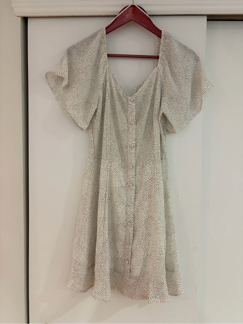NWT Sienna Sky short flowy dress almost white with black dots. Size M